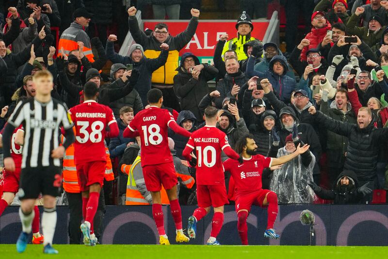 Mohamed Salah celebrates scoring his second goal and Liverpool's fourth in the 4-2 win. AP