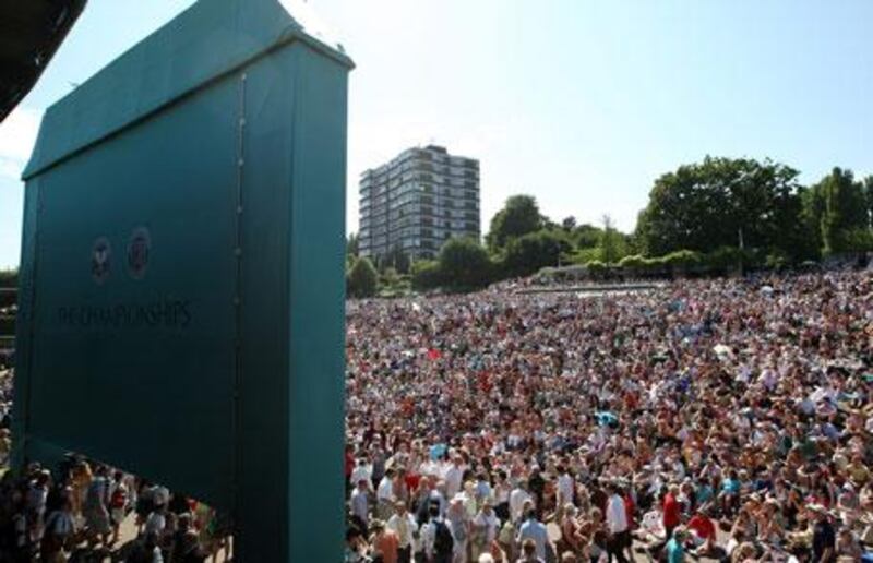 Spectators set up on Murray Mound at the All England Lawn Tennis and Croquet Club to watch their new hero, Andy Murray.