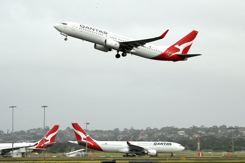 A Qantas passenger plane takes off from Sydney International Airport. The airline says its long-haul flights between Perth and London will not fly over Iran until further notice. AFP