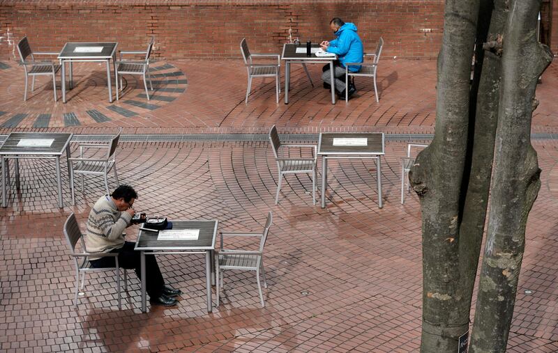 People have a lunch break at Shinjuku business district in Tokyo, Japan.   EPA
