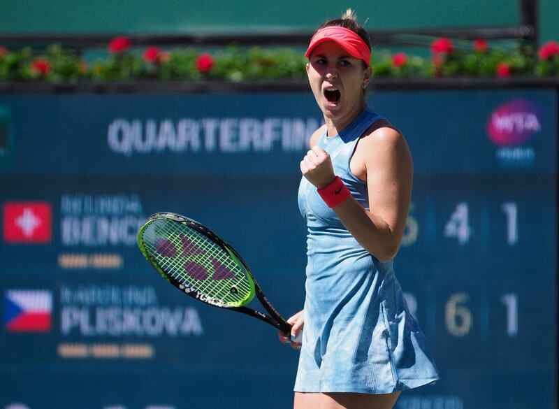 epa07437707 Belinda Bencic of Switzerland reacts after a point against Karolina Pliskova of the Czech Republic  during the BNP Paribas Open tennis tournament at the Indian Wells Tennis Garden in Indian Wells, California, USA, 14 March 2019. The men's and women's final will be played, 17 March 2019.  EPA/JOHN G. MABANGLO