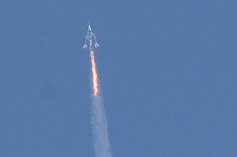 The Virgin Galactic SpaceShipTwo spaceplane 'Unity' and mothership separate as they fly way above Spaceport America, near the city of Truth or Consequences in New Mexico on July 11, 2021 on the way to outer space. AFP