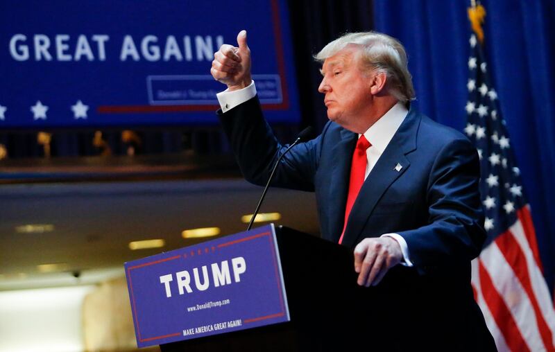 Real estate mogul Donald Trump announces his bid for the presidency in the 2016 presidential race during an event at the Trump Tower on the Fifth Avenue in New York City on June 16, 2015. Trump, one of America's most flamboyant and outspoken billionaires, threw his hat into the race Tuesday for the White House, promising to make America great again. The 69-year-old long-shot candidate ridiculed the country's current crop of politicians and vowed to take on the growing might of China in a speech launching his run for the presidency in 2016. "I am officially running for president of the United States and we are going to make our country great again," he said from a podium bedecked in US flags at Trump Tower on New York's Fifth Avenue. The tycoon strode onto the stage after sailing down an escalator to the strains of "Rockin' In The Free World" by Canadian singer Neil Young after being introduced by daughter Ivanka. His announcement follows years of speculation that the man known to millions as the bouffant-haired host of American reality TV game show "The Apprentice" would one day enter politics. Trump identifies himself as a Republican, and has supported Republican candidates in the past. But in his announcement speech he did not explicitly say if he was running for the party's nomination or as an independent.AFP PHOTO/ KENA BETANCUR (Photo by KENA BETANCUR / AFP)