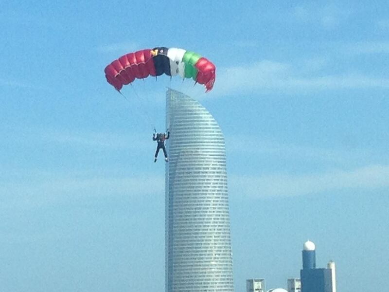 People on Abu Dhabi's Corniche were treated to a spectacle this morning as parachuting daredevils swooped in for a National Day celebration. Kristina Armstrong