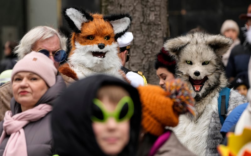 Dressed revellers wait for the traditional carnival parade in Duesseldorf, Germany - the higlight of the country's carnival season. AP