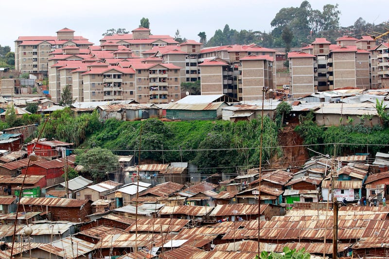 A government slum upgrading project undertaken by United Nations (UN) Habitat, is seen near the sprawling Kibera slum in Kenya's capital Nairobi, in this general view taken August 26, 2011. The Kibera slum is one of the largest and poorest slums in Africa and home to about 1 million people.      REUTERS/Thomas Mukoya (KENYA - Tags: SOCIETY) - RTR2QCI6