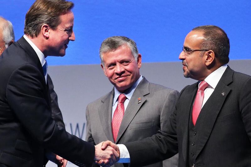The British prime minister, David Cameron, left, who delivered a keynote address to the forum on Tuesday, greets Salman bin Hamad Al Khalifa, the crown prince of Bahrain, right, while King Abdullah of Jordan looks on. Stephen Lock for The National