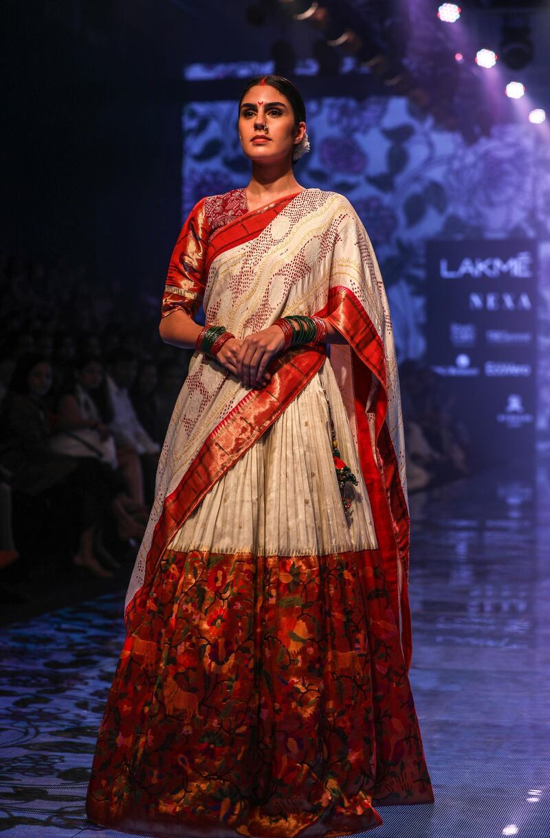 epa07788252 Models present creations by fashion brand store Gaurang during the Lakme Fashion Week (LFW) Winter/Festive 2019 in Mumbai, India, 23 August 2019. More than 75 designers are showcasing their collections at the event until 25 August.  EPA/DIVYAKANT SOLANKI
