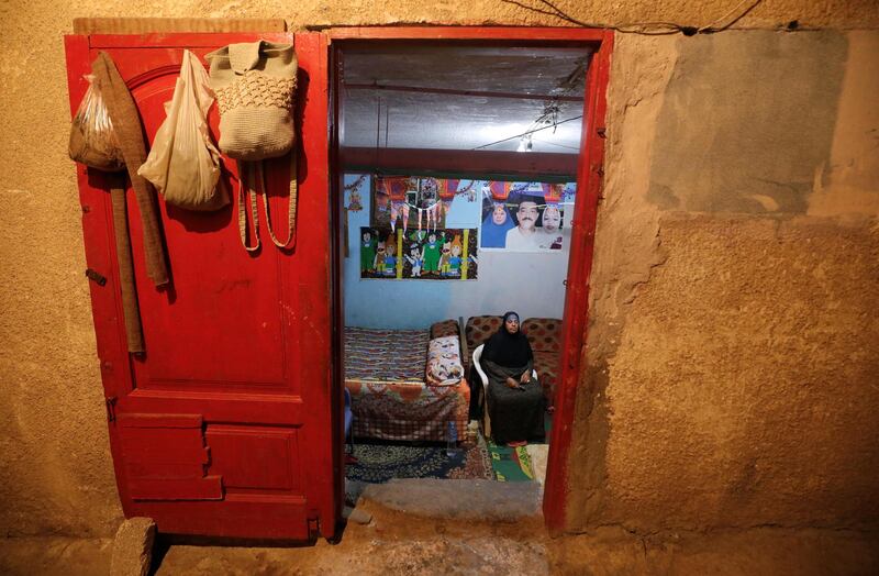 Zineb Mohamed "Om Hany", a 59-year-old woman concierge, watches television in Cairo, Egypt. When asked, what will you miss most about being in lockdown? Zineb replied : " I will miss life being quiet, especially at night ". Reuters