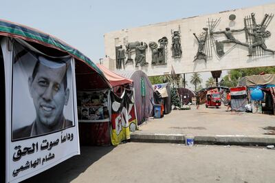 A poster of Hisham Al Hashemi at Tahrir Square in Baghdad Reuters