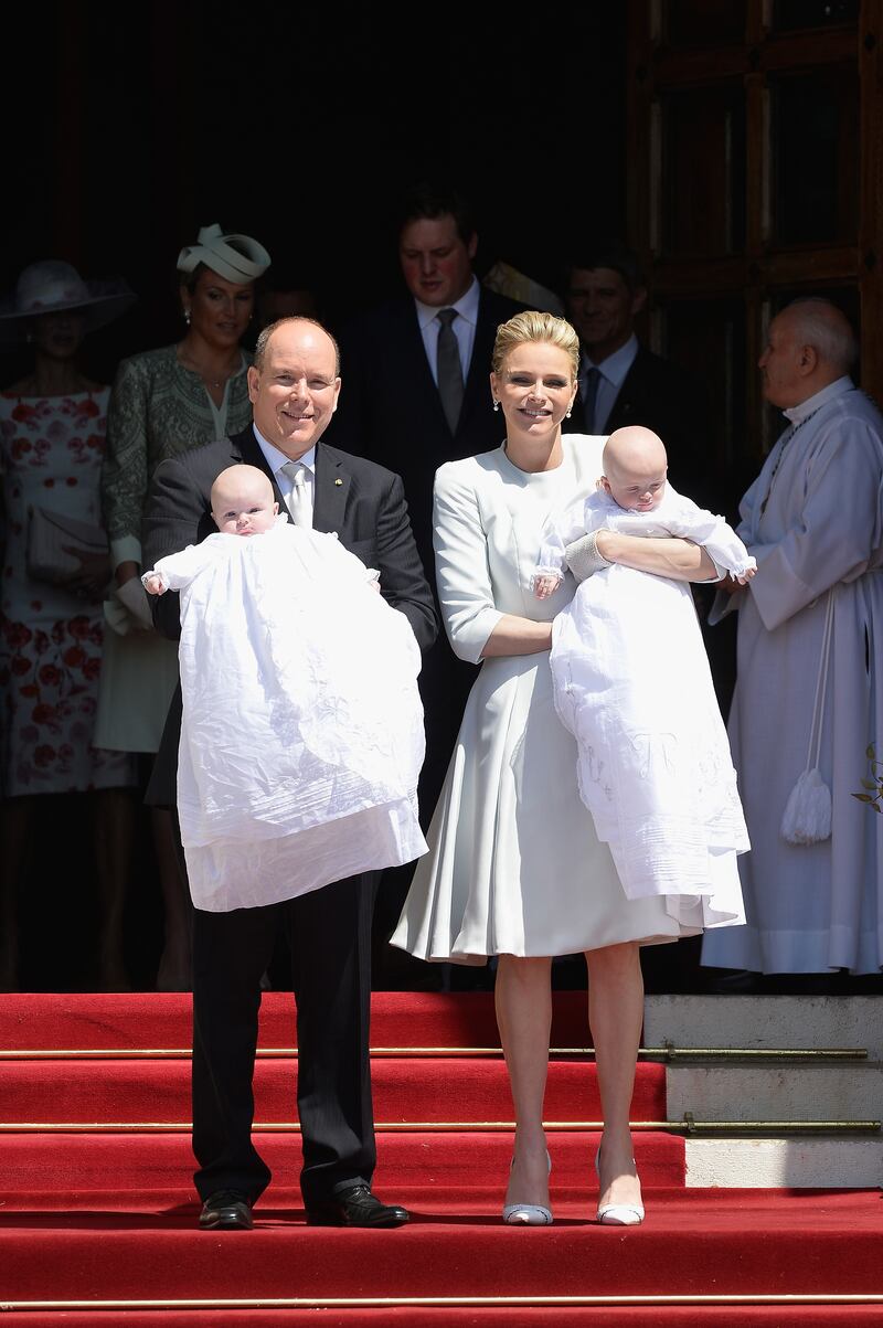 Prince Albert II of Monaco and Princess Charlene, in a Dior shirt and top, attend the christening of their children, Princess Gabriella and Prince Jacques of Monaco on May 10, 2015 in Monaco. Getty Images