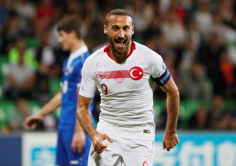Turkey's Cenk Tosun celebrates scoring their first goal in a 4-0 win. Reuters