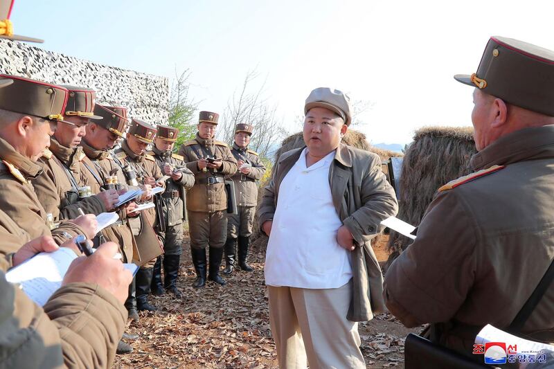 North Korean leader Kim Jong Un supervises a mortar firing drill in North Korea in an undated government released image. Korea News Service via AP  