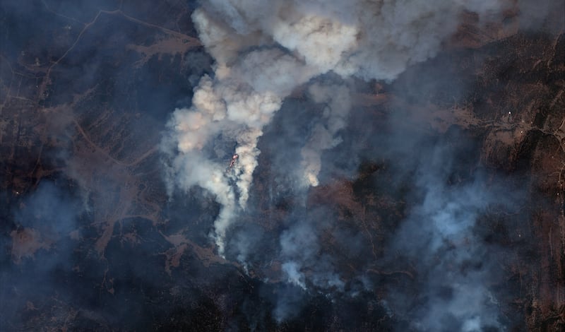 A satellite image shows the fire lines of the Hermits Peak wildfire east of Santa Fe, New Mexico. Maxar Technologies / Reuters