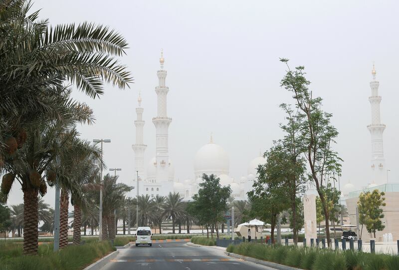 Abu Dhabi, U.A.E., July 23, 2018.   White haze at Abu Dhabi due to sand storms. --  Sheikh Zayed Grand Mosque.
Victor Besa / The National
Section:  NA