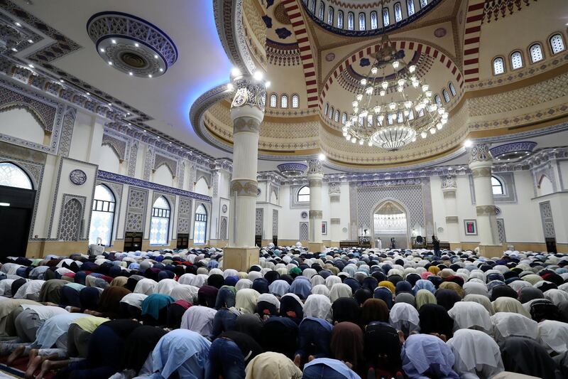 Dubai, United Arab Emirates - August 11, 2019: Early morning Eid prayers take place at Al Farooq Omar Bin Al Khattab Mosque. Sunday the 11th of August 2019. Al Farooq Omar Bin Al Khattab Mosque, Dubai. Chris Whiteoak / The National