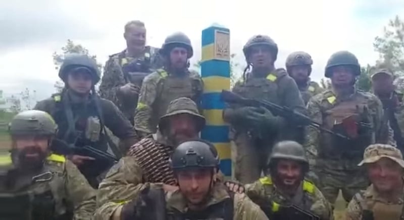 A screengrab obtained from a video shows Ukrainian troops at the Ukraine-Russia border, in what was said to be the Kharkiv region. Reuters