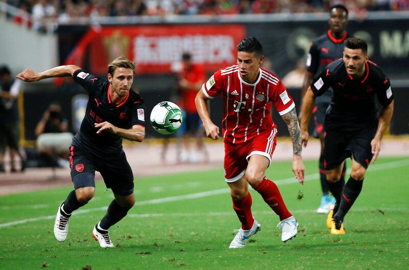 Bayern Munich's James Rodriguez in action with Arsenal's Nacho Monreal. Damir Sagolj / Reuters