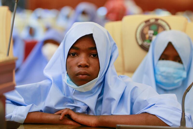 Girls who were kidnapped from a boarding school in the northwest Nigerian state of Zamfara, look on after their release in Zamfara, Nigeria. Reuters