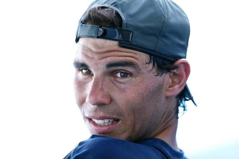 Rafael Nadal of Spain looks on in a practice session during day two of the Australian Open. Matt King / Getty Images