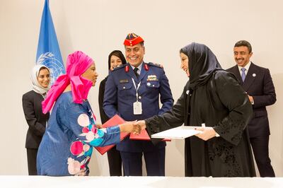 Phumzile Mlambo-Ngcuko, director of UN Women, Sheikh Abdullah bin Zayed, Minister of Foreign Affairs and International Co-operation, and Noura Al Suwaidi, director general of The General Women’s Union in 2018, at the signing of an initiative to help Arab women get into the military and peacekeeping forces. Credit: UN Women