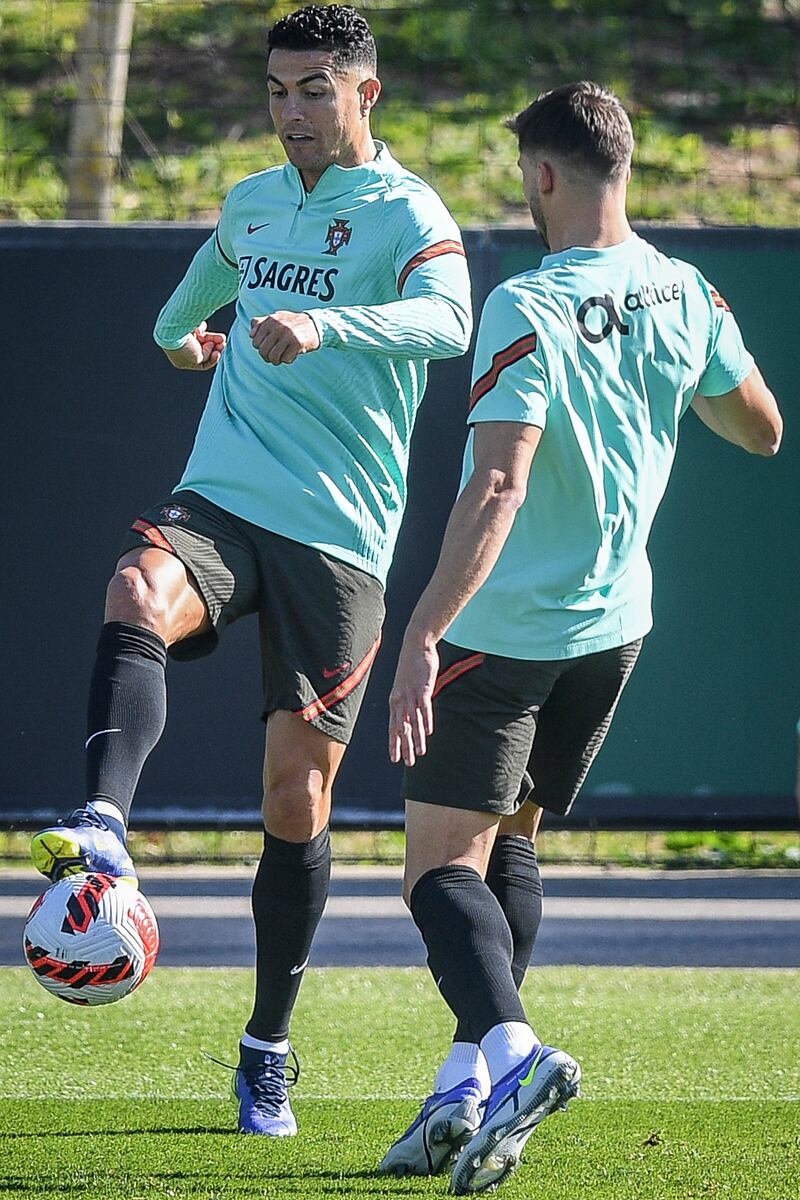 Cristiano Ronaldo trains for Portugal's World Cup qualifier against Serbia. AFP