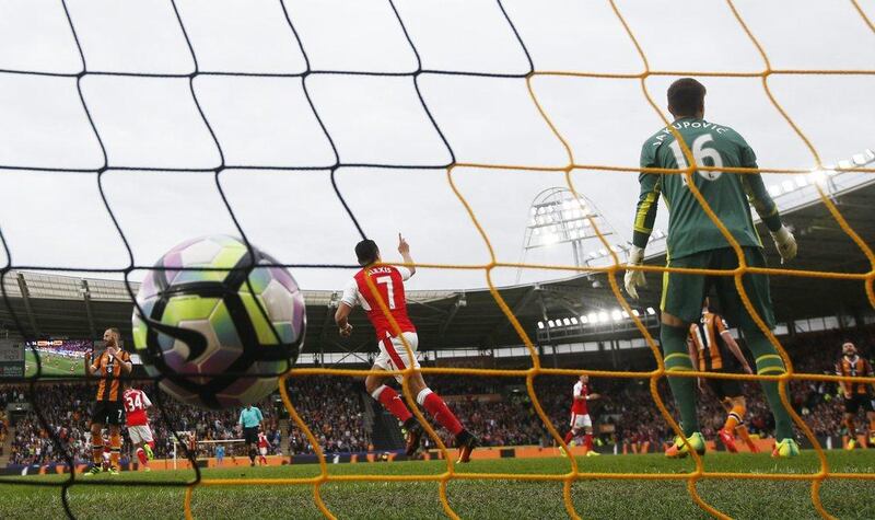 Arsenal’s Alexis Sanchez celebrates scoring their first goal. Lee Smith / Action Images / Reuters