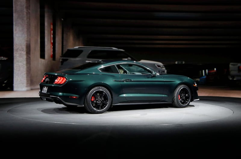 Celebrating the 50th anniversary of iconic movie "Bullitt" and its fan-favorite San Francisco car chase, Ford introduces the new 2019 Mustang Bullitt at the North American International Auto Show, Sunday, Jan. 14, 2018, in Detroit. (AP Photo/Carlos Osorio)