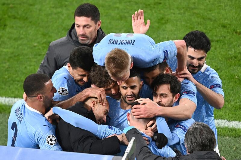 Manchester City celebrate the winning goal. PA