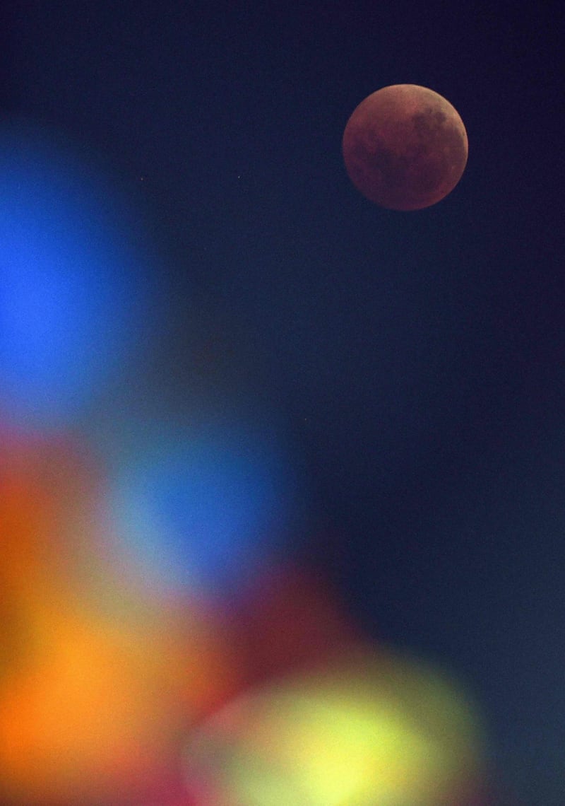 The moon is seen during the lunar eclipse in Chennai, India. Arun Sankar / AFP Photo.