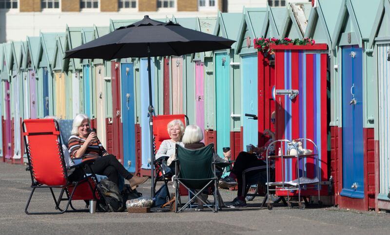 Members of the University of the Third Age iPhone photography group take advantage of the easing of lockdown and unseasonably warm weather to have an impromptu get together in Brighton. Getty Images