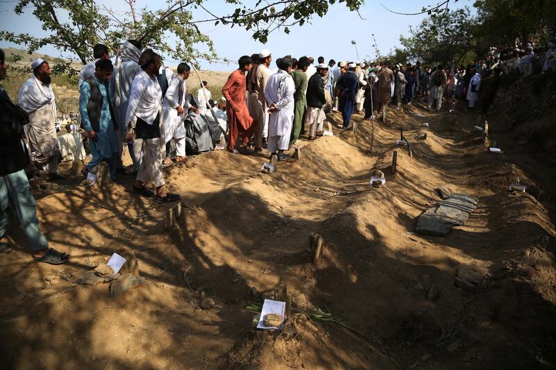 People attend the funeral and burial of the victims a day after an explosion at a mosque in Haska Mena district of Nangarhar province, Afghanistan.  EPA