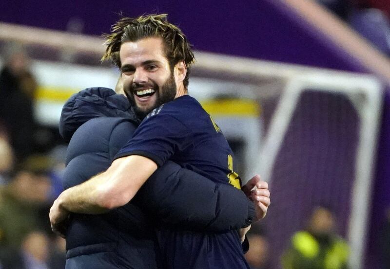 Nacho celebrates his goal with Real Madrid's French coach Zinedine Zidane. AFP