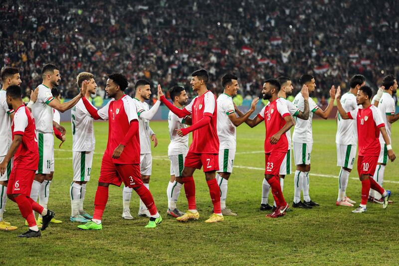 Iraqi and Omani players before the start of the 25th Arabian Gulf Cup final. AFP