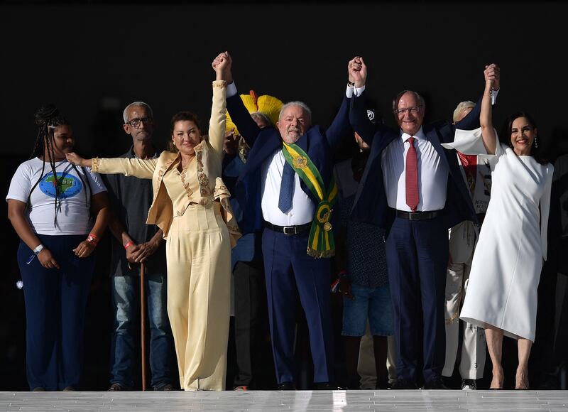 Front row, from left, first lady Rosangela da Silva, President Luiz Inacio Lula da Silva, Vice President Geraldo Alckmin and  Maria Lucia Ribeiro Alckmin, at Planalto Palace, after the inauguration ceremony at the National Congress, in Brasilia. AFP