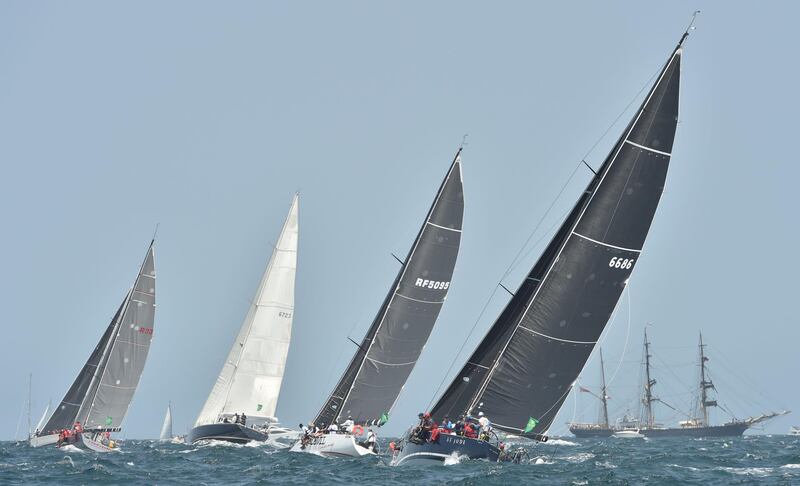 Competitors sail out of Sydney Harbour at the start of the Sydney Hobart Yacht Race on Thursday, December 26. AFP