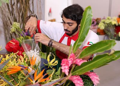 Abu Dhabi, United Arab Emirates - October 15th, 2017: Eissa Al Marzooqi of the UAE competes in the floristry category at day 1 of World Skills 2017. Young people from 77 countries will come together and compete in 51 different skills competitions. Sunday, October 15th, 2017 at Abu Dhabi National Exhibition Center, Abu Dhabi. Chris Whiteoak / The National