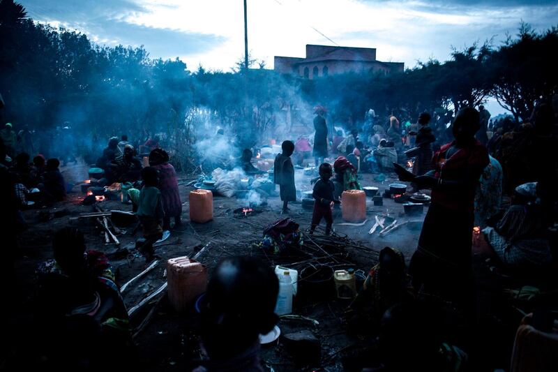 Thousands of displaced Congolese take refuge in the grounds of a Catholic church in Drodro. AFP