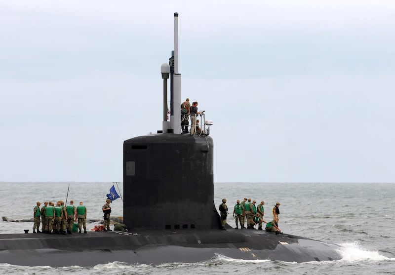 October 1, 2018 - Cape Canaveral, Florida, United States - Crew members are seen on the USS Indiana, a nuclear powered United States Navy Virginia-class fast attack submarine, as it departs Port Canaveral in Florida on October 1, 2018, on its maiden voyage as a commissioned submarine. The nearly 380-foot-long USS Indiana was commissioned in a ceremony at Port Canaveral on September 29, 2018, and is the Navy's 16th Virginia-Class fast attack submarine. 


 (Photo by Paul Hennessy/NurPhoto via Getty Images)