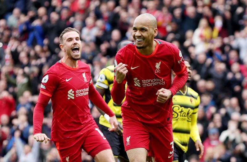 Fabinho celebrates scoring with Jordan Henderson. Reuters