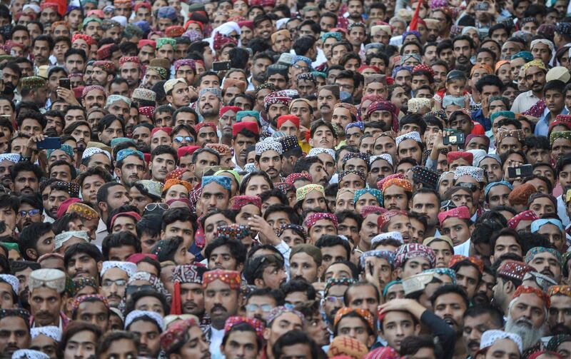 Pakistani men wearing traditional Sindhi caps gather to celebrate Sindhi Topi Ajrak Day in Karachi. AFP