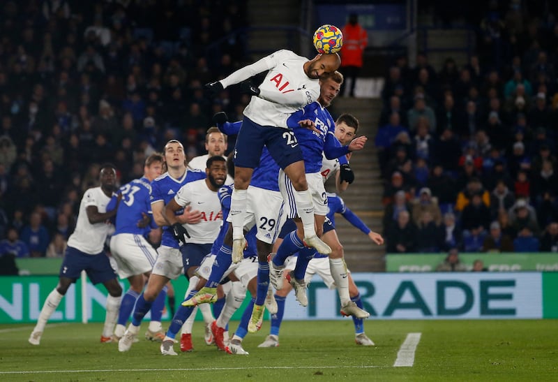 Tottenham Hotspur's Lucas Moura wins a header in the Leicester box. Reuters