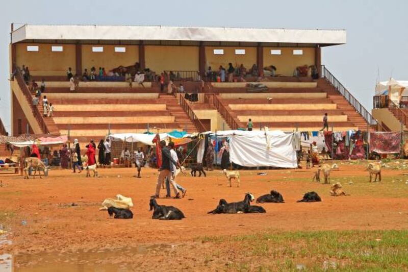 A stadium offers temporary shelter after for those displaced by floods in the village of Makaylab. AFP