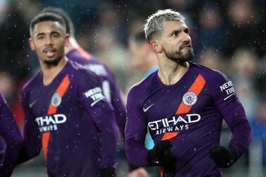 Manchester City's Sergio Aguero, right, scored once in their win over Swansea City at Liberty Stadium on Saturday. Nick Potts / AP Photo