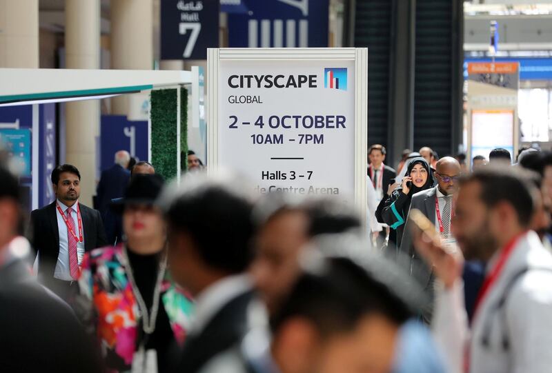 Dubai, United Arab Emirates - October 02, 2018: People arrive at the World Trade Centre for Cityscape Global 2018. Tuesday, October 2nd, 2018 at World Trade Centre, Dubai. Chris Whiteoak / The National