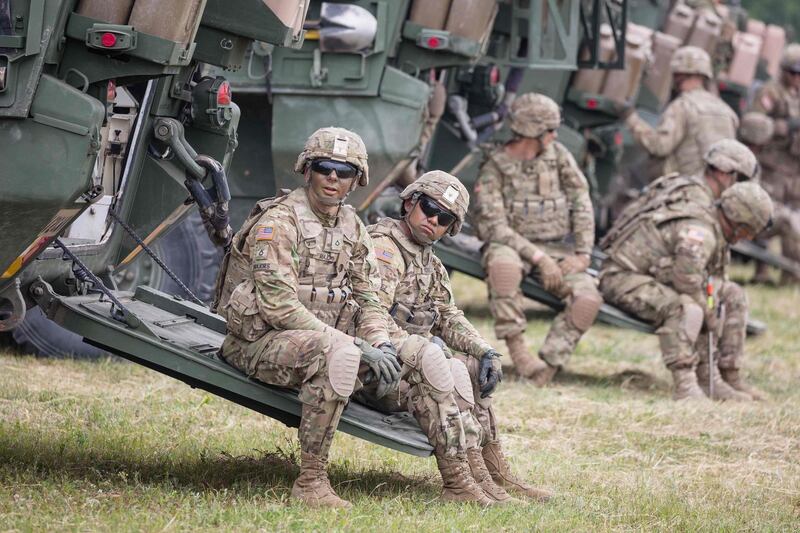 (FILES) In this file photo taken on June 16, 2017 American Soldiers are seen during NATO Saber Strike military exercises  in Orzysz, Poland.  Some 18,000 troops from 19 mostly NATO countries begin annual Saber Strike exercises in Poland and the Baltic states on June 3, 2018, run by the US Army Europe to boost combat readiness on the alliance's eastern flank as it faces an ever-more assertive Russia. / AFP / -
