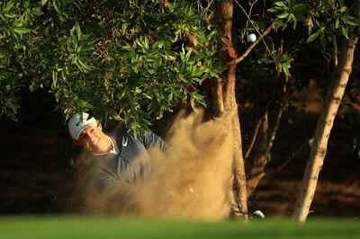 ABU DHABI, UNITED ARAB EMIRATES - JANUARY 18:  Rory McIlroy of Northern Ireland plays his third shot from a bunker on the tenth hole during round one of the Abu Dhabi HSBC Golf Championship at Abu Dhabi Golf Club on January 18, 2018 in Abu Dhabi, United Arab Emirates.  (Photo by Andrew Redington/Getty Images)