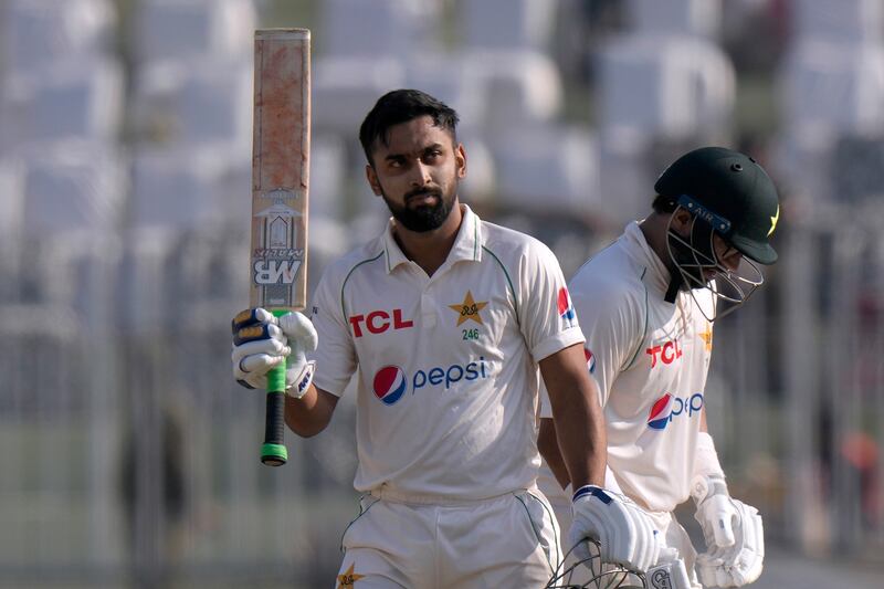 Pakistan's Abdullah Shafique celebrates reaching his century. AP