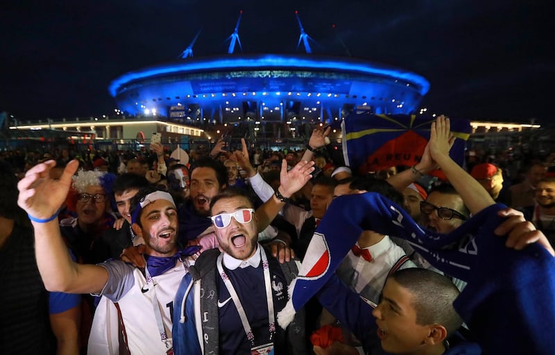 France fans celebrate outside the stadium in St. Petersburg. Reuters