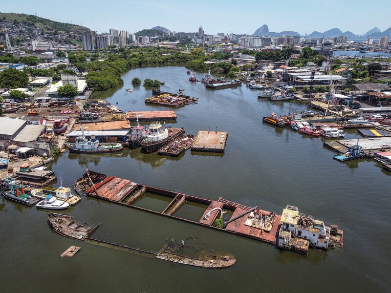The remains of sunken ships in one of the access channels to Guanabara Bay near Rio de Janeiro. The bay has become a cemetery for abandoned ships, threatening the environment and creating risks for navigation and the infrastructures that surround it.  EPA